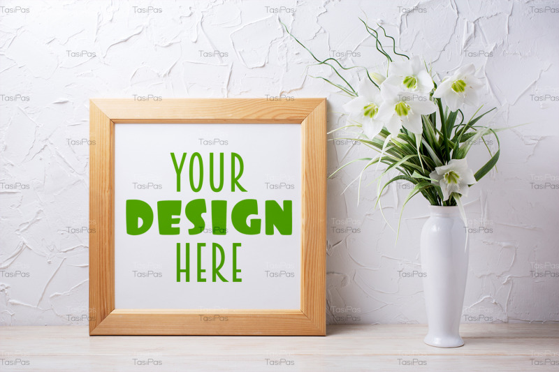 square-wooden-picture-frame-mockup-with-lily-in-the-white-vase