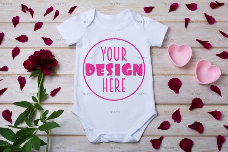 white-baby-short-sleeve-bodysuit-mockup-with-pink-hearts-two-pink-hear
