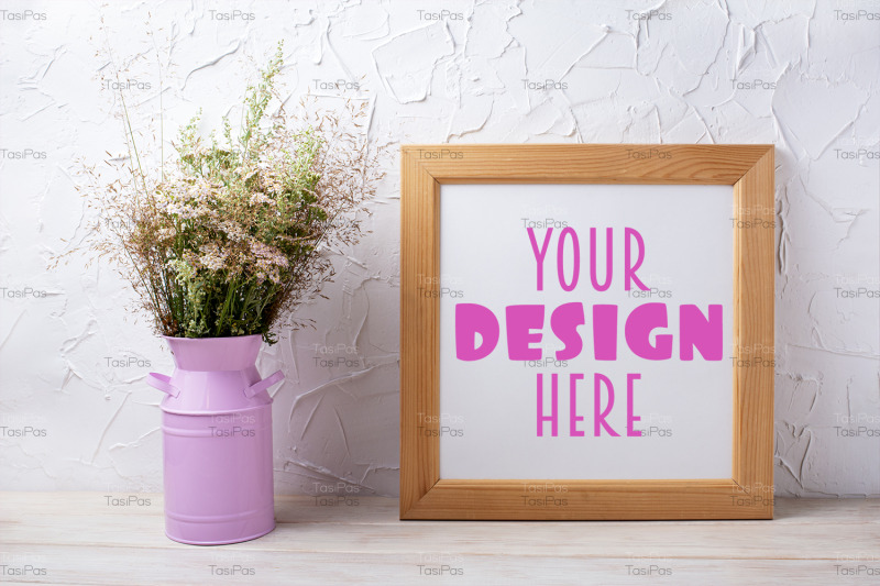 square-wooden-picture-frame-mockup-with-wild-grass-in-the-pink-can