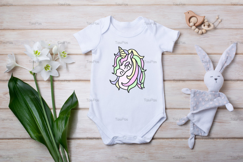 white-baby-short-sleeve-bodysuit-mockup-with-lily-and-bunny-rabbit