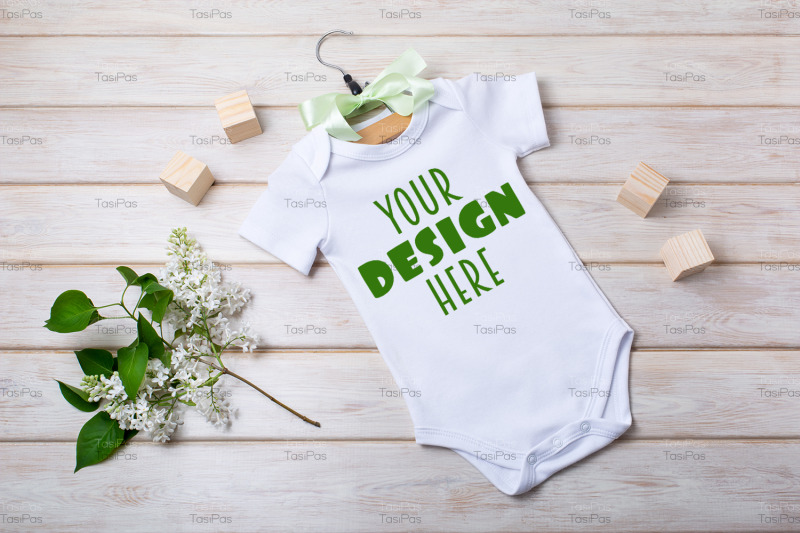 white-cotton-baby-short-sleeve-onesie-mockup-with-white-lilac