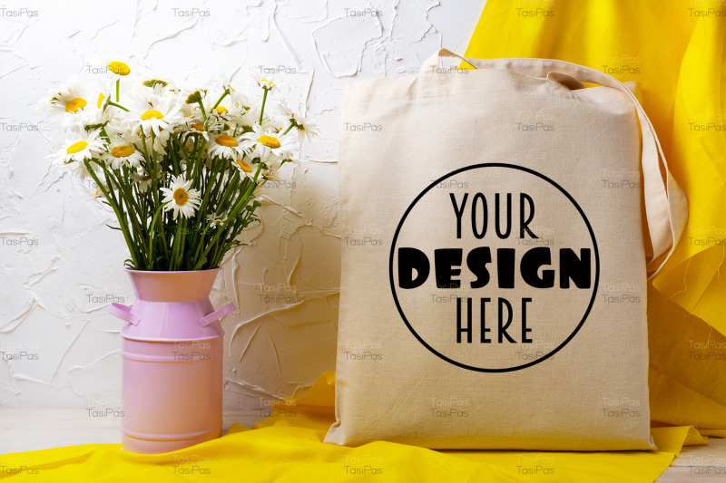 rustic-tote-bag-mockup-with-wild-daisy-flowers-in-the-pink-can