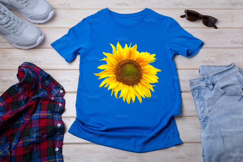 unisex-blue-t-shirt-mockup-with-trainers-and-jeans