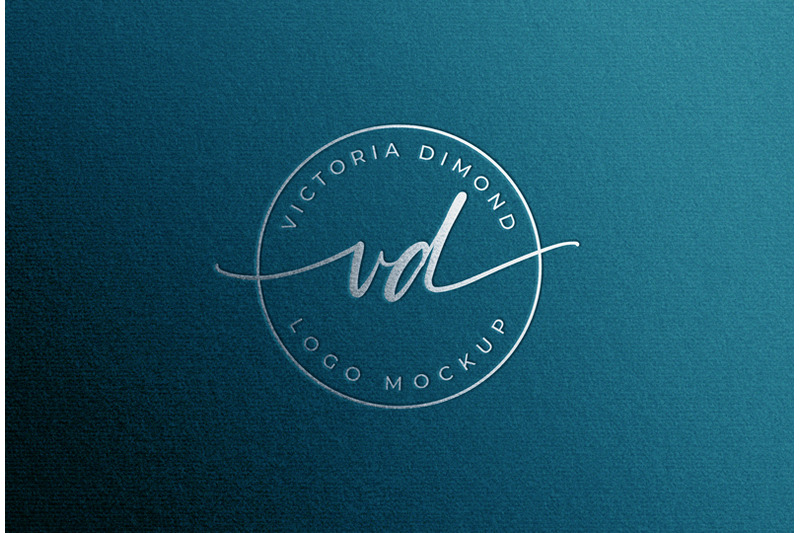 feminine-silver-foil-stamping-logo-mockup-on-blue-teal-paper