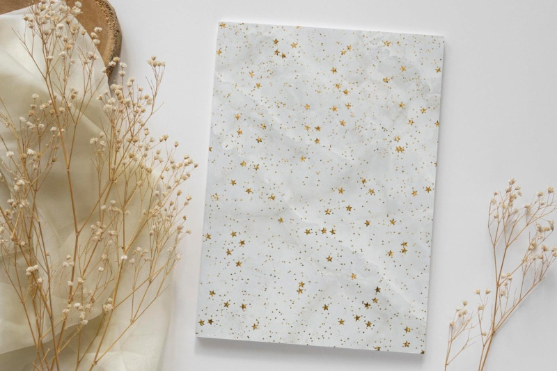 white-marble-papers-with-gold-stars