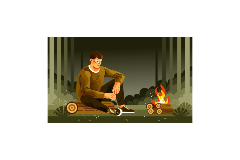 young-man-sitting-at-a-campfire