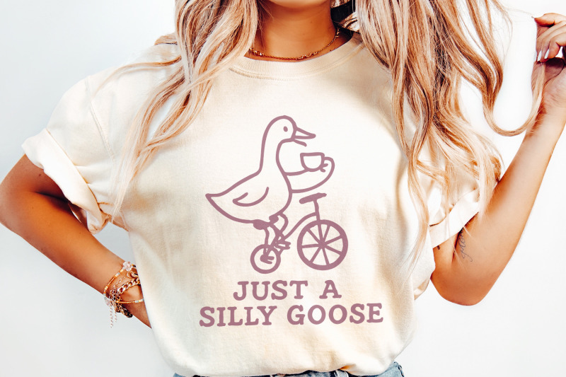 just-a-silly-goose-png-funny-goose-drinking-tea-on-bicycle-whimsical