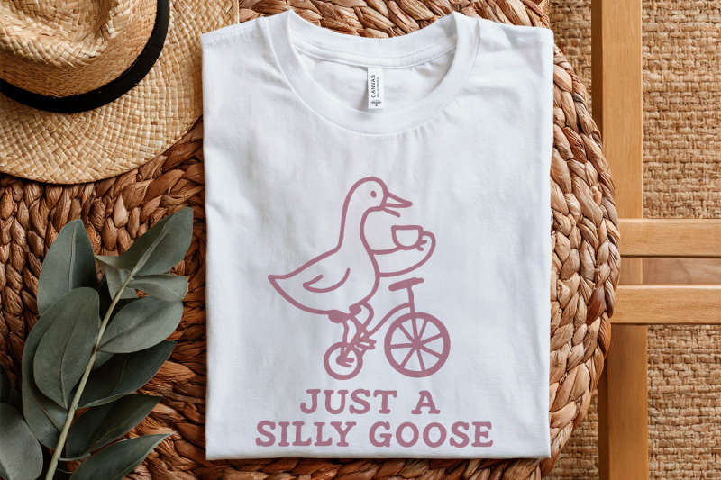 just-a-silly-goose-png-funny-goose-drinking-tea-on-bicycle-whimsical