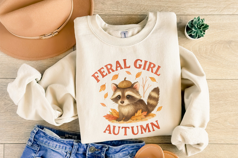 feral-girl-autumn-png-cute-raccoon-with-acorn-hat-png-cozy-fall-leav