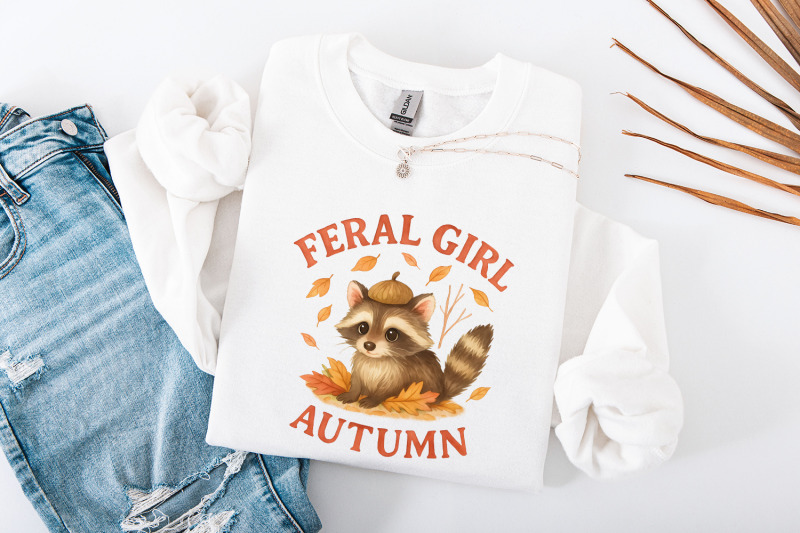 feral-girl-autumn-png-cute-raccoon-with-acorn-hat-png-cozy-fall-leav