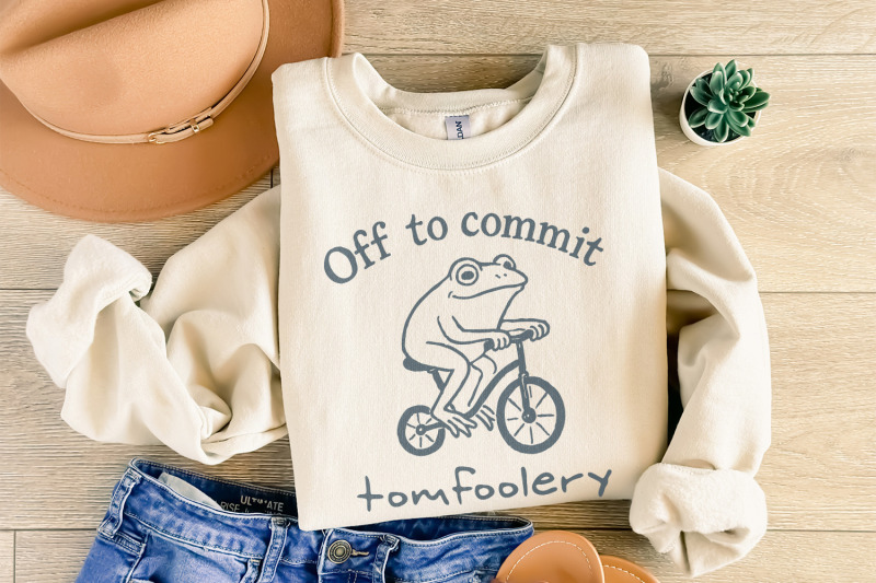 off-to-commit-tomfoolery-funny-frog-on-bicycle-whimsical-animal-humor