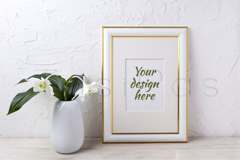 gold-decorated-frame-mockup-with-tender-white-lily-in-vase