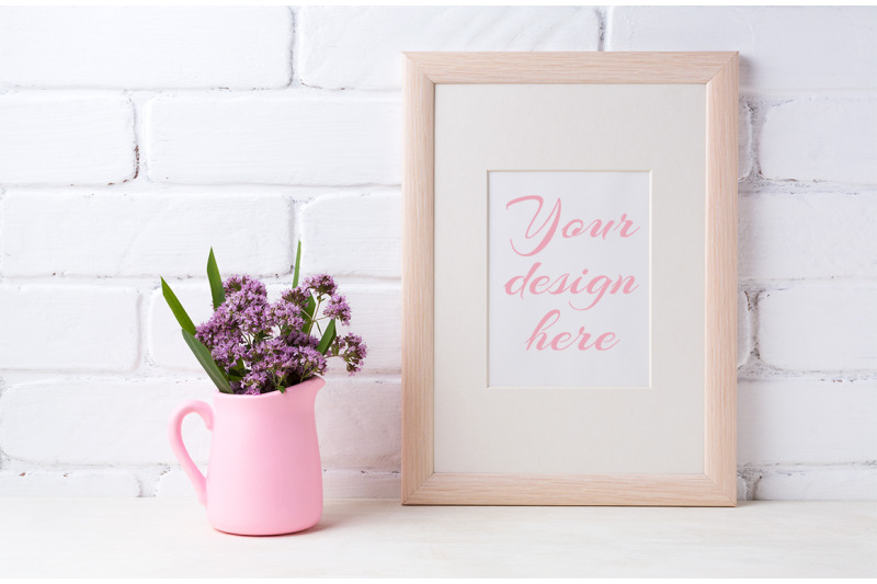 wooden-frame-mockup-with-purple-flowers-in-pink-pitcher