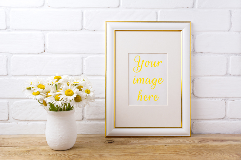 gold-decorated-frame-mockup-with-chamomile-bouquet-in-rustic-vase