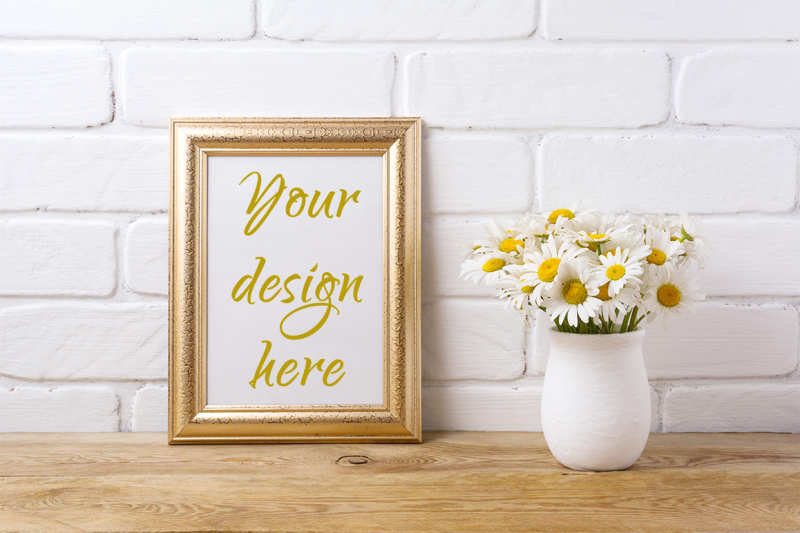 golden-frame-mockup-with-chamomile-bouquet-in-rustic-vase