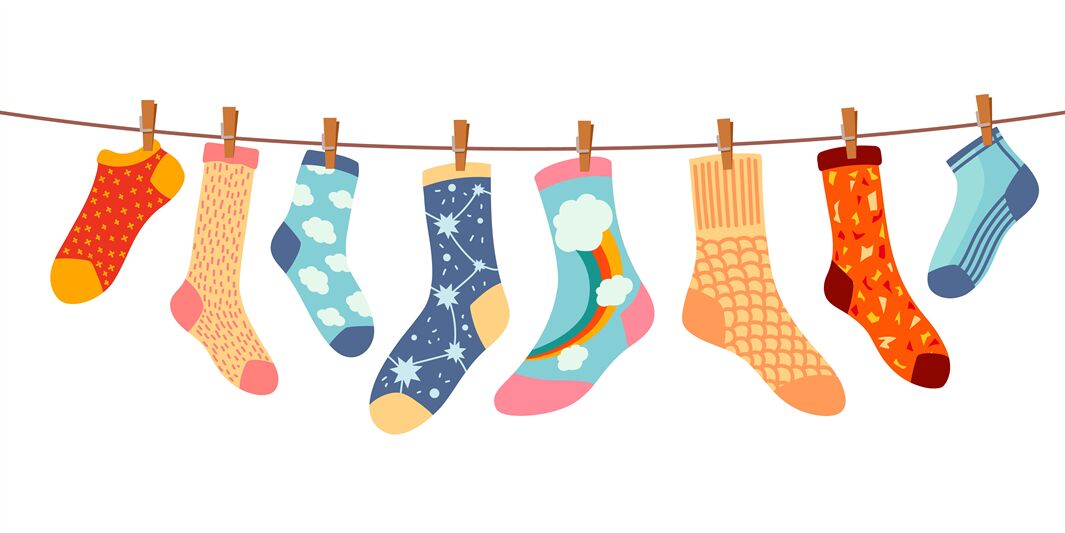 Socks on rope. Cotton or wool sock dry and hang on laundry string